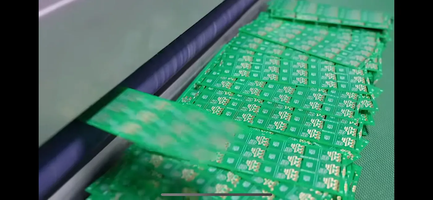 PCB panels moving through a production process